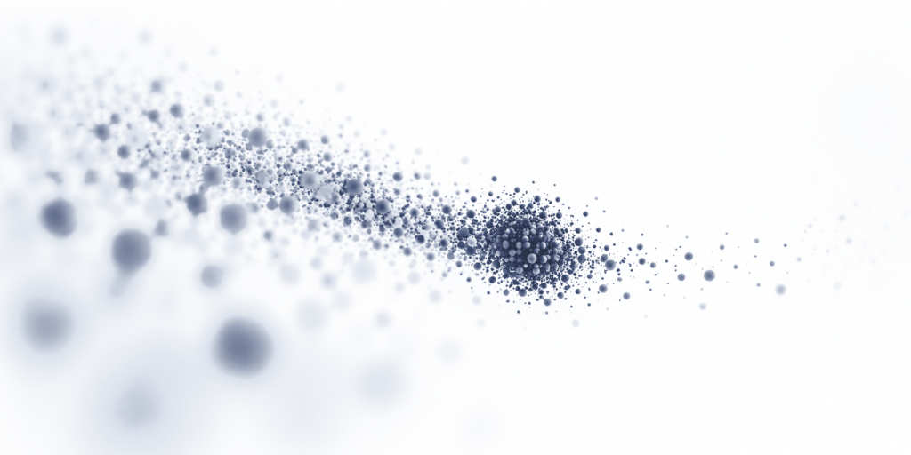A curving stream of small dots that packs into one dense cluster, thick on one side of it and sparse on the other
